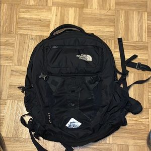 Black north face book bag